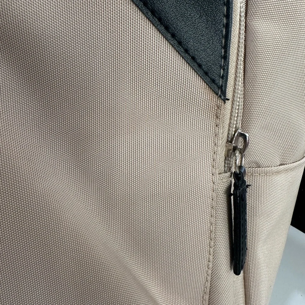 Calvin Klein Tan and Black Laptop Bag with Sturdy Fabric
